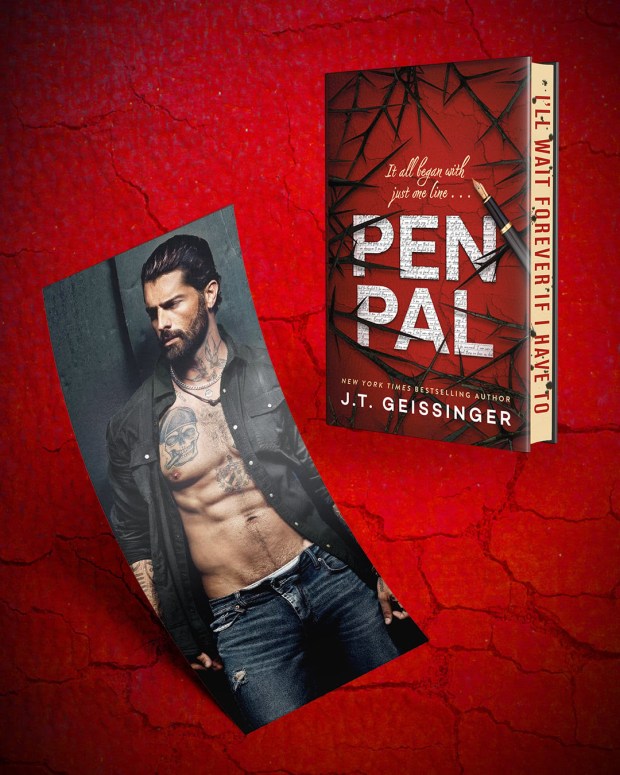 A book cover of 'Pen Pal' by J.T. Geissinger featuring a muscular man with tattoos, wearing a black shirt and denim jeans, set against a red textured background.
